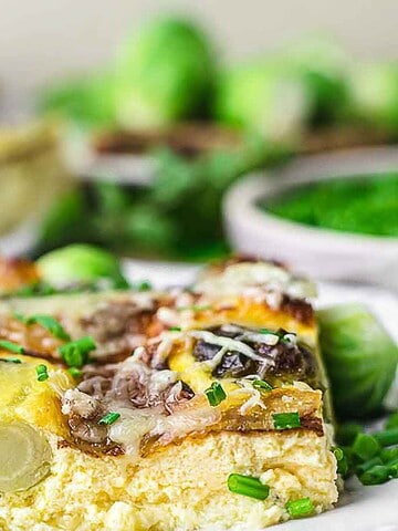 Brussel Sprouts Casserole piece on a white plate.