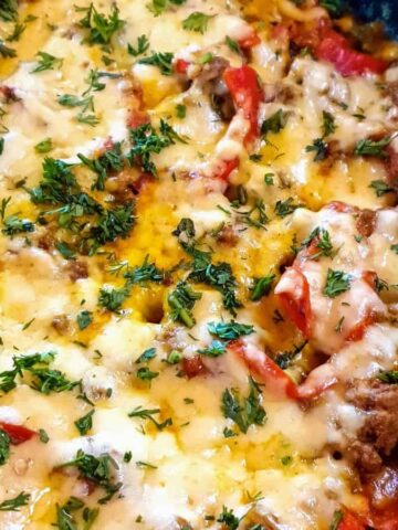 Cheesy Ground Beef Taco Skillet garnished with fresh cilantro.