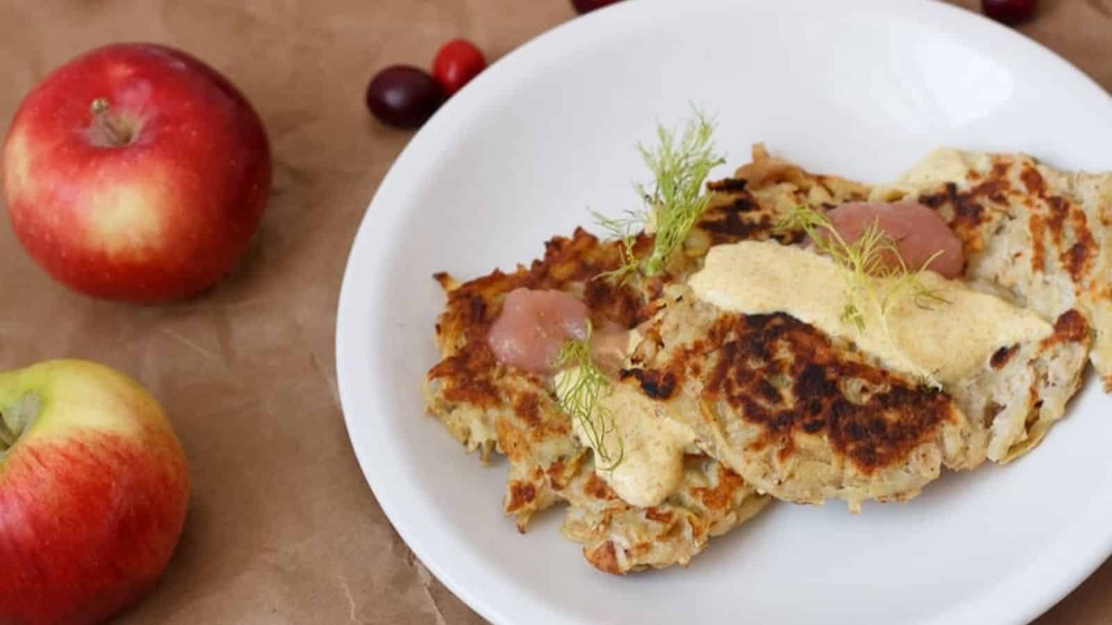 Cranberry pancakes with cranberry sauce.