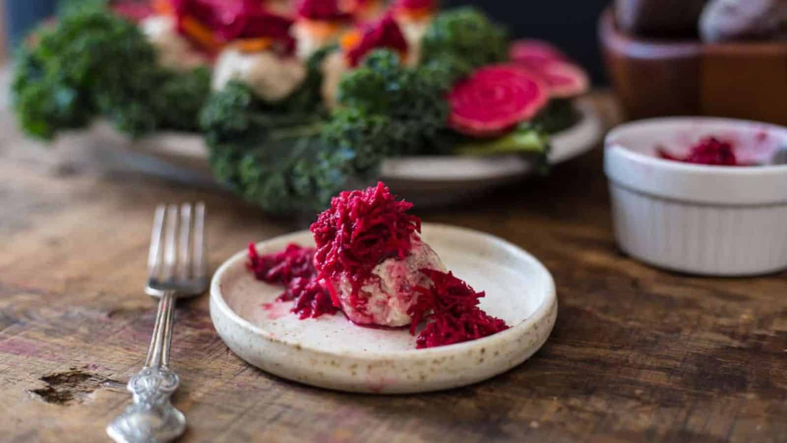 Gefilte fish on plate with beet horseradish.