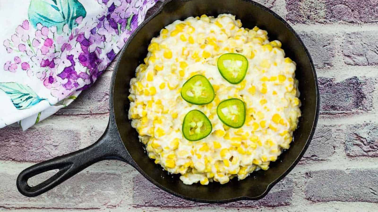 Smoked Creamed Corn in a black skillet.