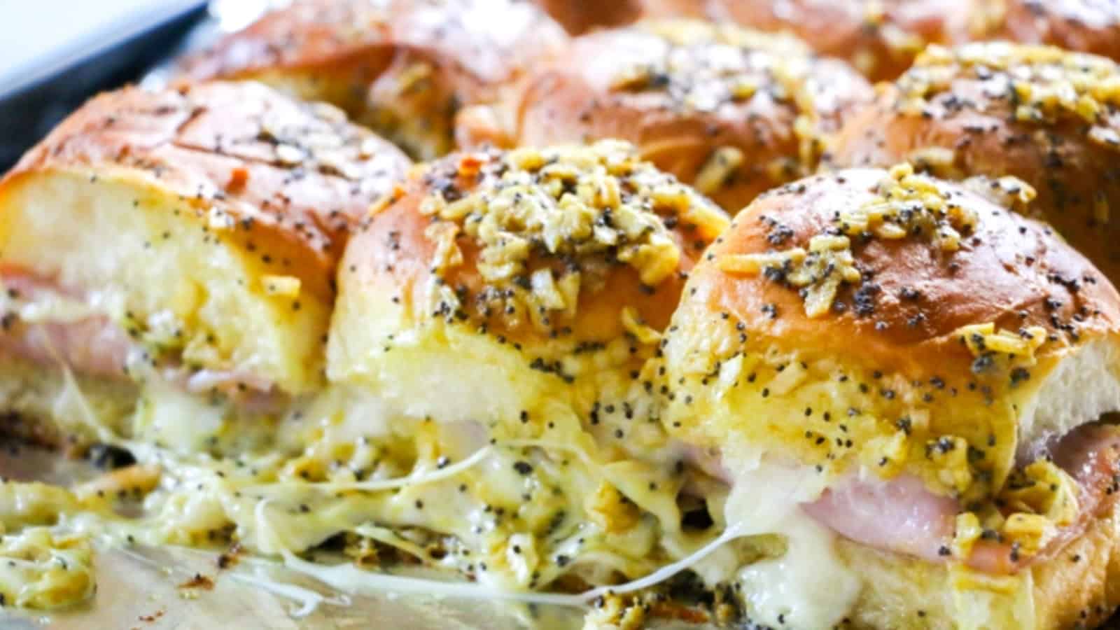 Easy Ham and Cheese Sliders with poppy seeds.