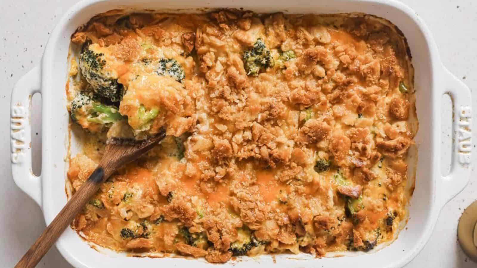 A casserole dish with broccoli and cheese in it.