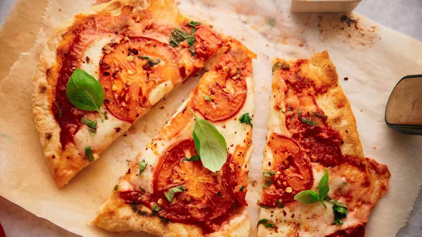 Two flatbread pizzas on a tray.
