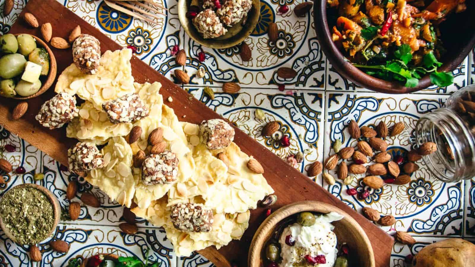 A tray of nuts and a container of natural delights.