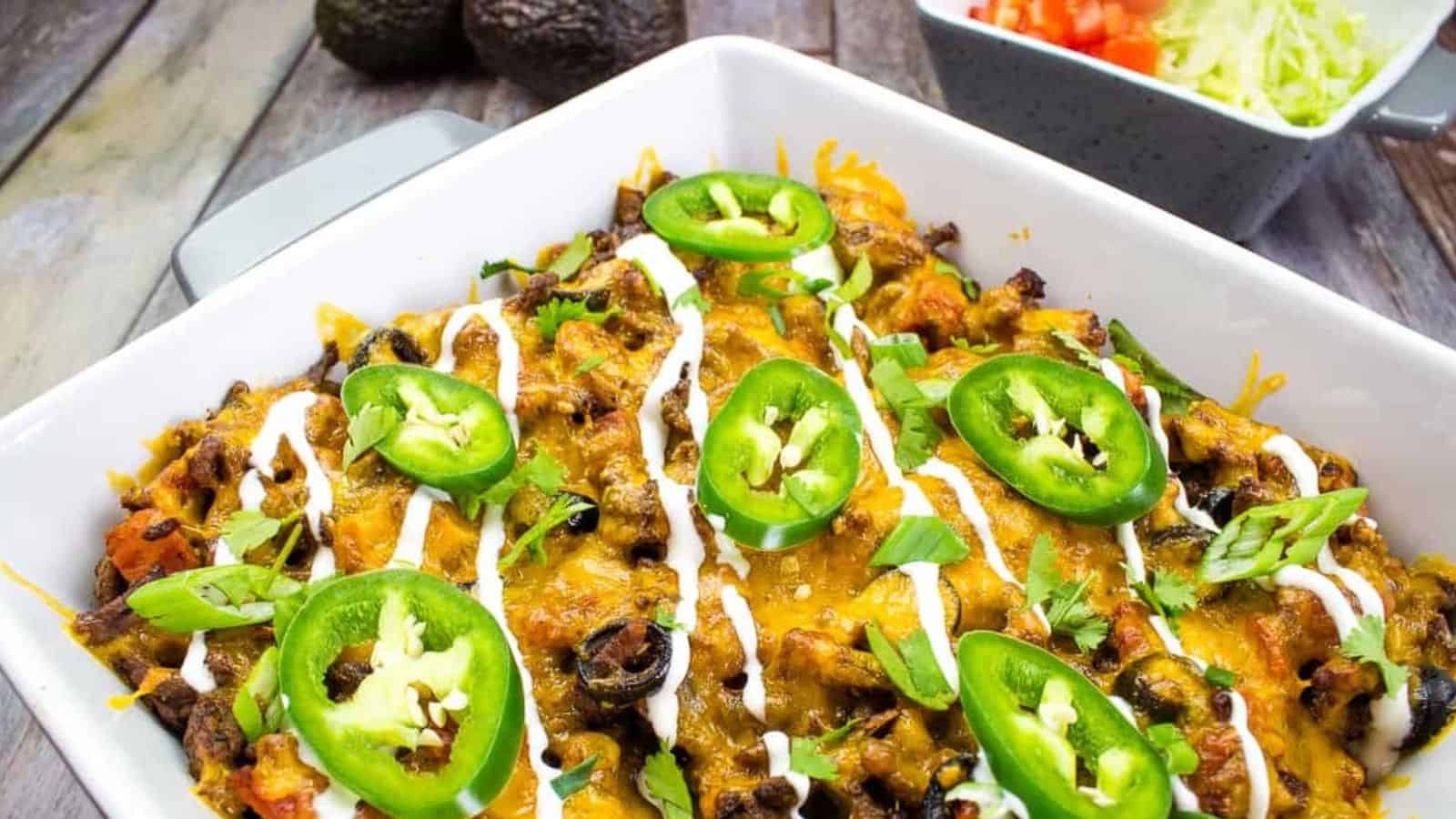 A Taco Casserole dish with black beans, cheese and jalapenos.