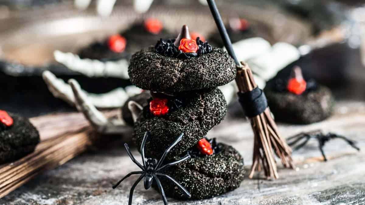 Witch hat cookies made with chocolate cookies and cone-shaped chocolate candies.